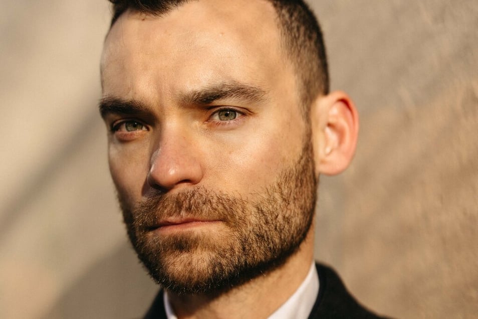 An F.B.I. Trainee Hung a Pride Flag Near His Desk. He Says He Was Fired for It.