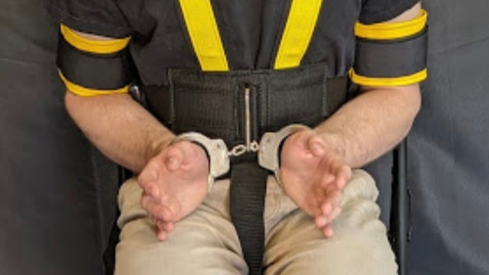 ICE's use of full-body restraints during deportations raises concerns over inhumane treatment