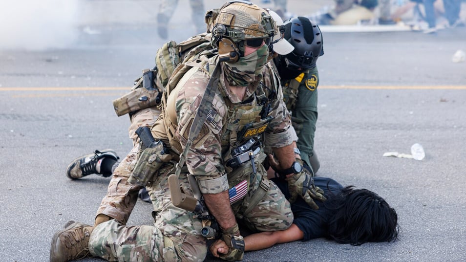 Using helicopters and chemical agents, immigration agents become increasingly aggressive in Chicago
