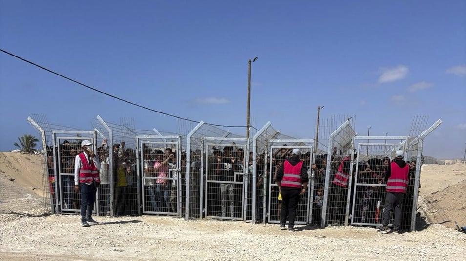 US contractors say their colleagues are firing live ammo as Palestinians seek food in Gaza